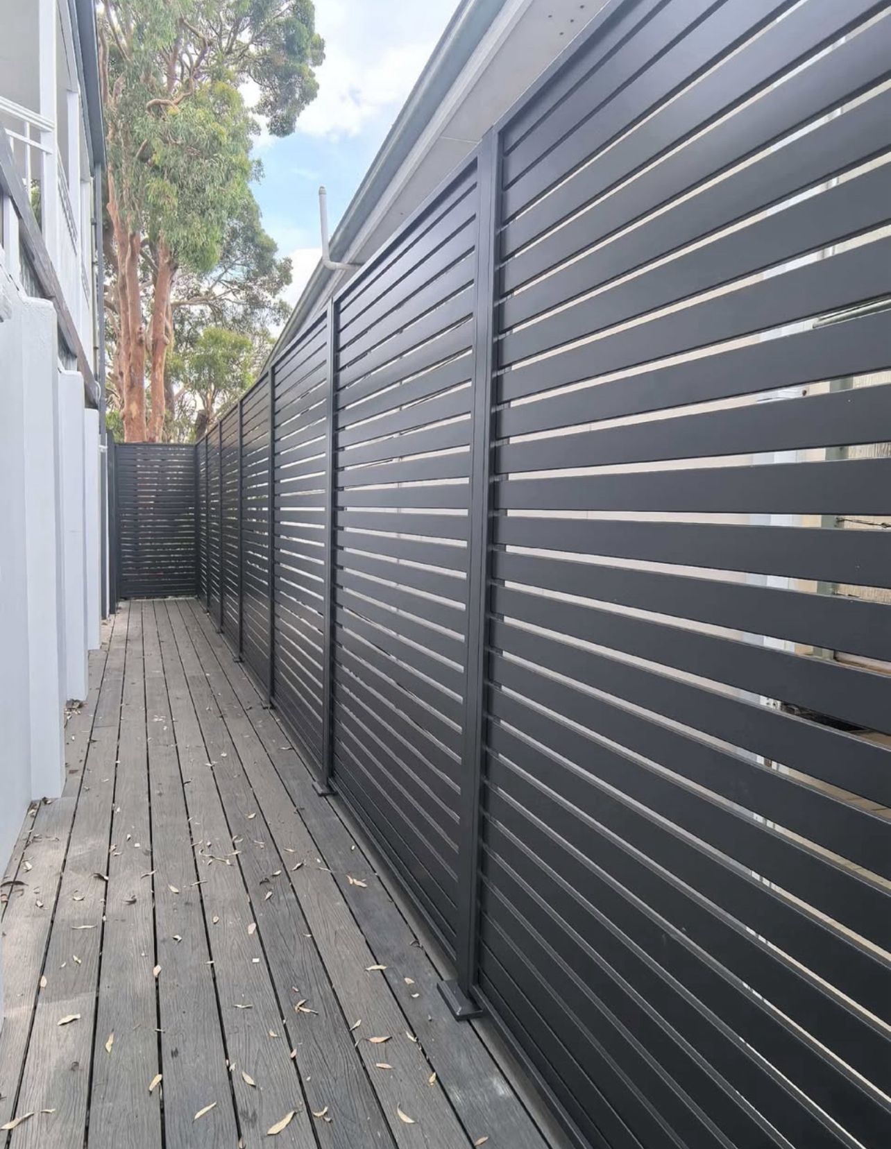 Acoustic aluminium slat boundary wall, Derrimut