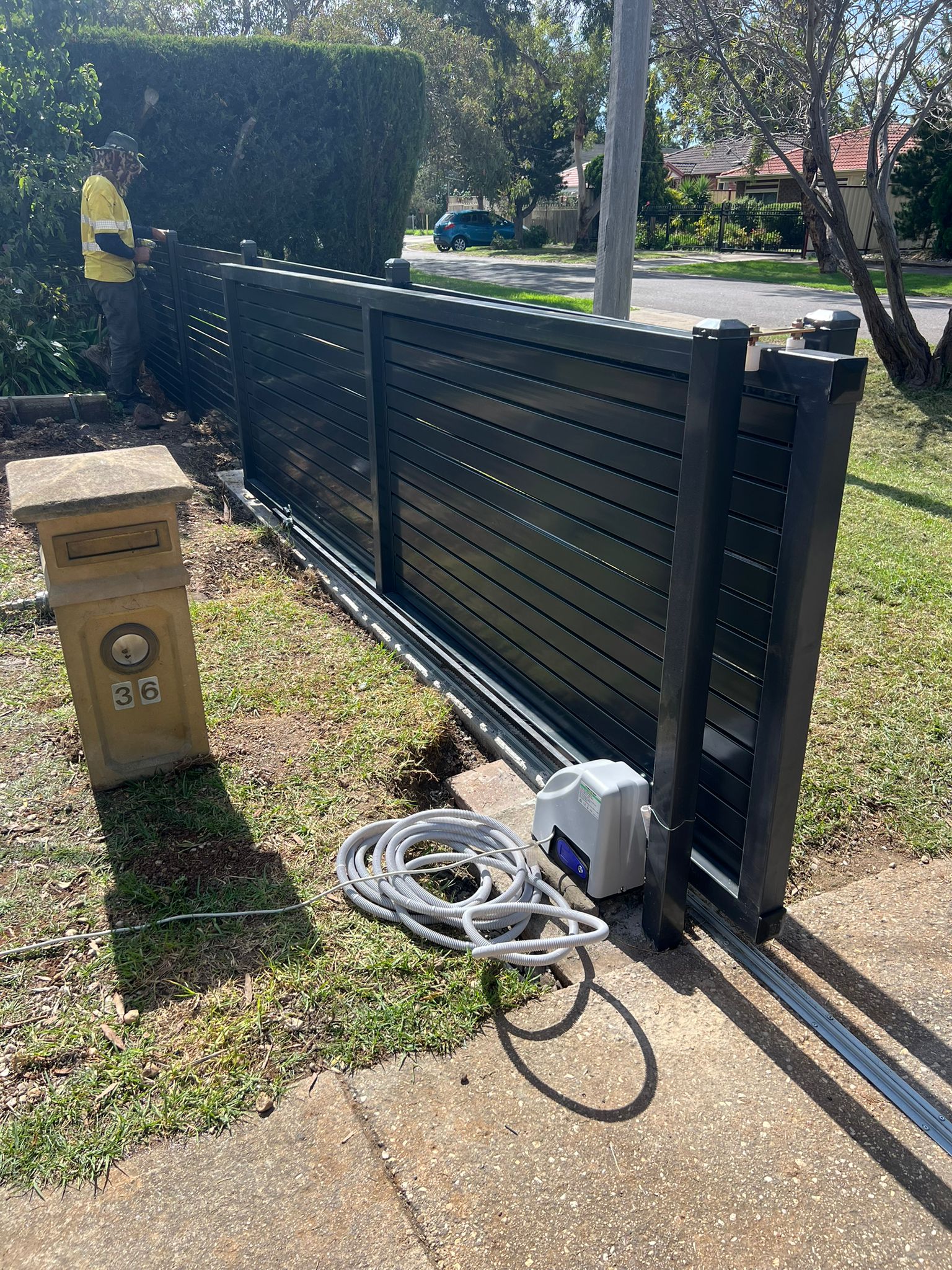 Automatic aluminium slat sliding driveway gate, Truganina